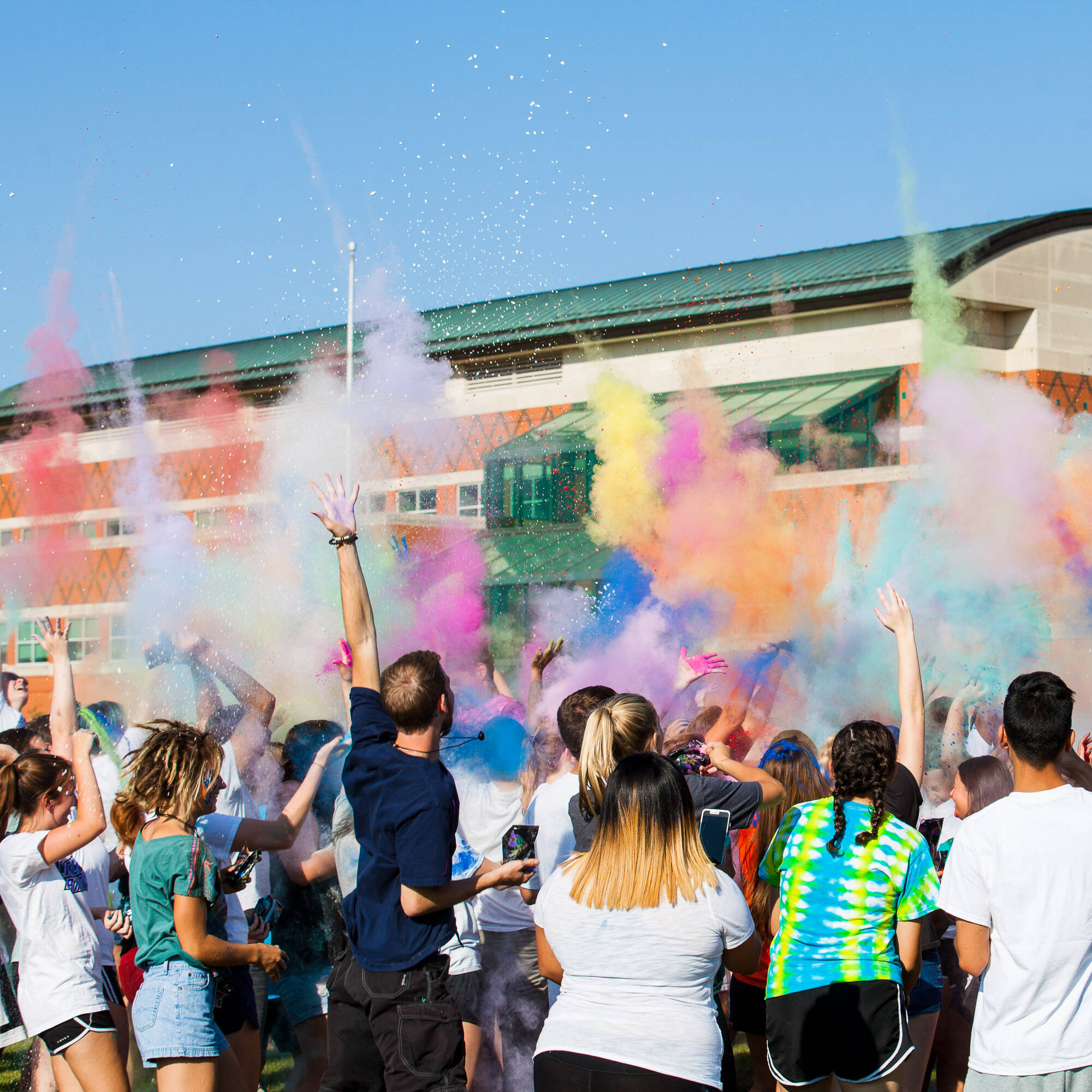 Students participate in Holi Festival